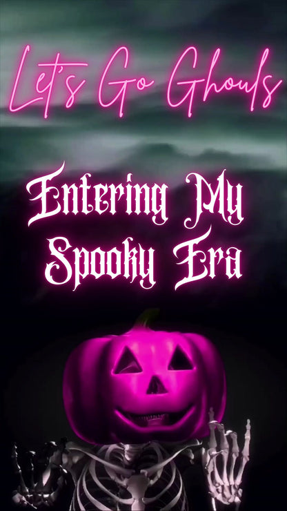 Editable pink spooky halloween party party video invitation displayed on a mobile phone, featuring an animated vertical digital invite with music, created in Canva. This premium video invitation template is designed for sharing by text, email, and social media and works with an interactive RSVP website for easy guest response tracking.