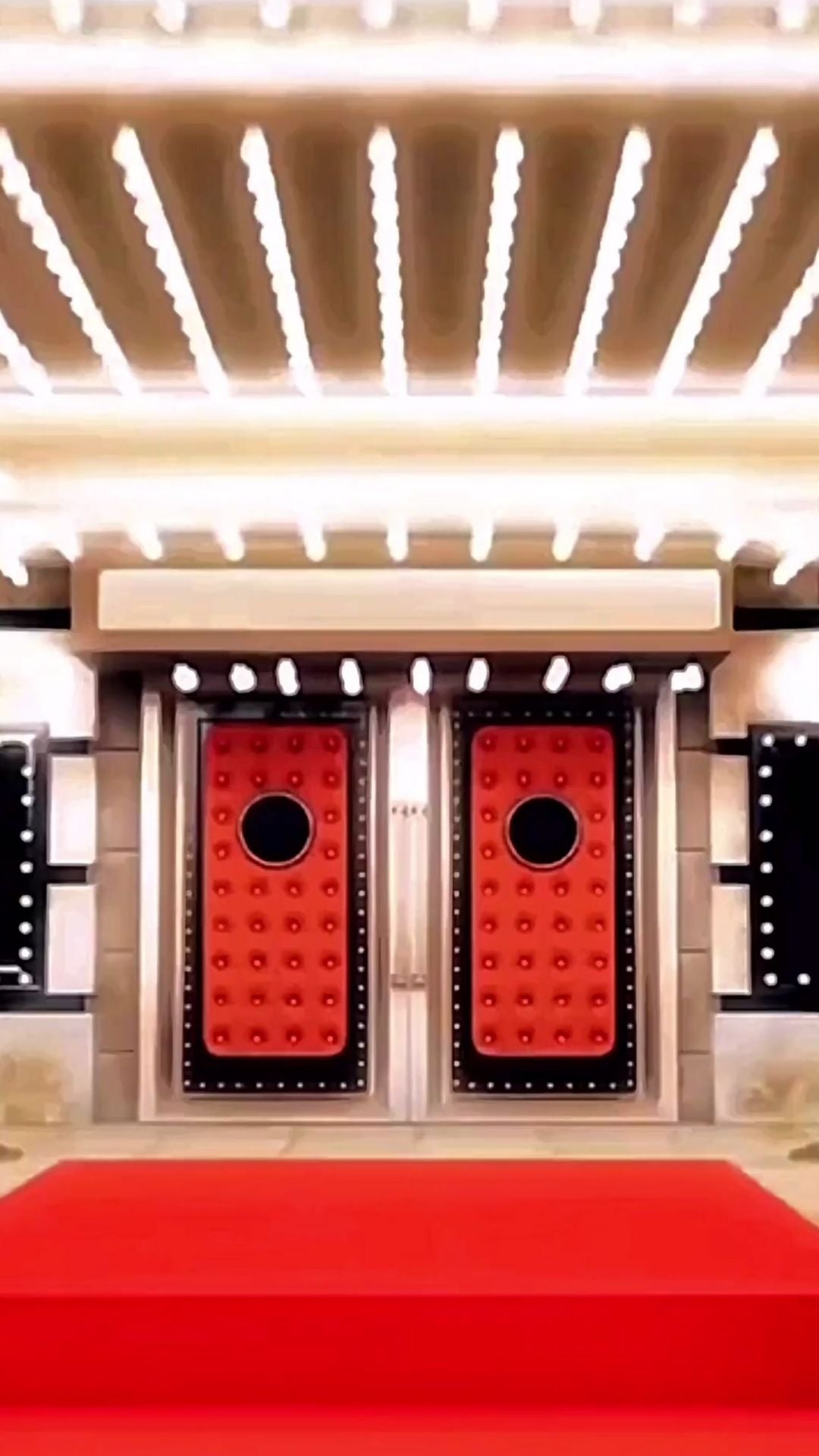 Editable hollywood red carpet 50th birthday birthday video invitation displayed on a mobile phone, featuring an animated vertical digital invite with music, created in Canva. This premium video invitation template is designed for sharing by text, email, and social media and works with an interactive RSVP website for easy guest response tracking.