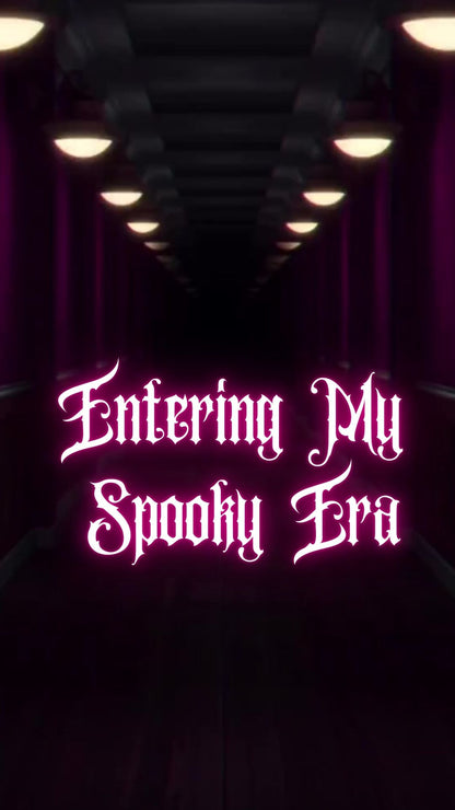 Editable halloween era party party video invitation displayed on a mobile phone, featuring an animated vertical digital invite with music, created in Canva. This premium video invitation template is designed for sharing by text, email, and social media and works with an interactive RSVP website for easy guest response tracking.