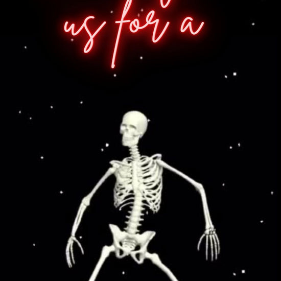 Editable neon skeleton halloween costume party party video invitation displayed on a mobile phone, featuring an animated vertical digital invite with music, created in Canva. This premium video invitation template is designed for sharing by text, email, and social media and works with an interactive RSVP website for easy guest response tracking.